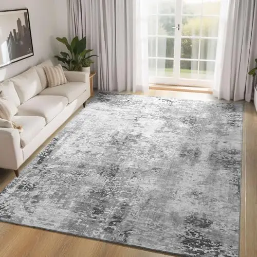Ompaa gray boho area rug with abstract pattern on floor